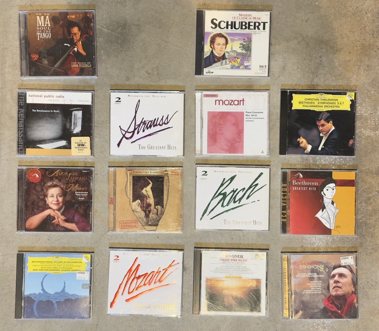 Fourteen classical CD cases arranged in a grid.